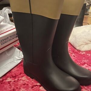 Lane Bryant 11W black and tan zip up rain boots.